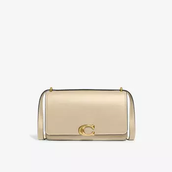 Кожаная сумка через плечо Bandit с металлическим логотипом Coach, слоновая кость