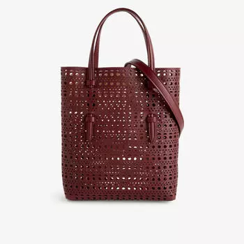 Кожаная сумка Mina с вырезами и верхней ручкой Alaia, цвет rouge grenat