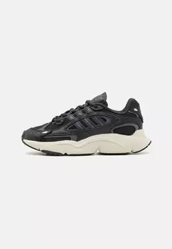 Кроссовки low OZMILLEN UNISEX adidas Originals, цвет carbon/grey six/core black