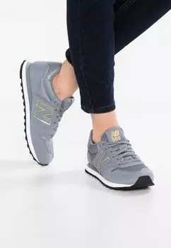 Кроссовки New Balance Gw500, серый / золотой