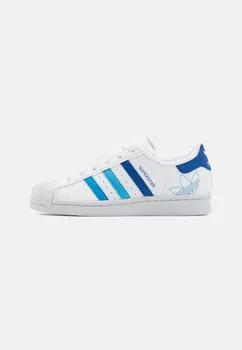 Кроссовки низкие SUPERSTAR J UNISEX adidas Originals, цвет footwear white/team royal blue/semi blue burst