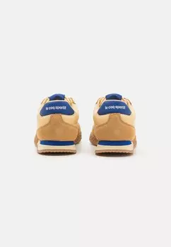 Кроссовки VELOCE I UNISEX le coq sportif, темно-желтый