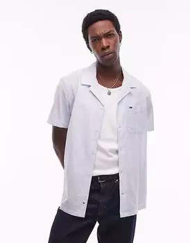 Льняная рубашка на пуговицах Tommy Jeans светло-голубого цвета