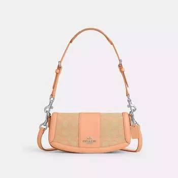 Маленькая сумка через плечо Coach Outlet Andrea из фирменного жаккарда, цвет Faded Blush