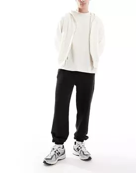 Мешковатые спортивные штаны с манжетами черного цвета Cotton:On