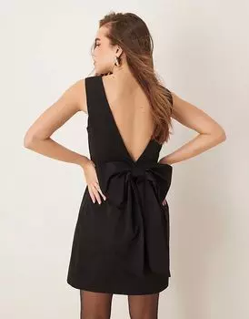 Мини-платье Gina Tricot с глубоким V-образным вырезом на спине и объемным бантом на спине черного цвета