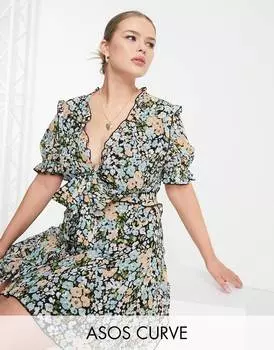 Мини-платье с завязками спереди и юбкой с рюшами ASOS DESIGN Curve с цветочным принтом