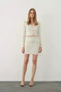 Мини-юбка из трикотажа розово-бежевого цвета Chanel Sherin