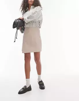 Мини-юбка нейтрального цвета из искусственной кожи с асимметричным швом Topshop