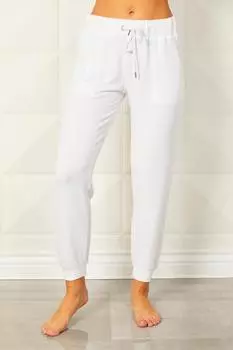 Мягкие эластичные спортивные штаны на шнурке в отбеленном цвете french kyss