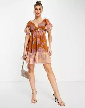 Мягкое ярусное мини-платье с завязками спереди ASOS DESIGN с комбинированным принтом пейсли