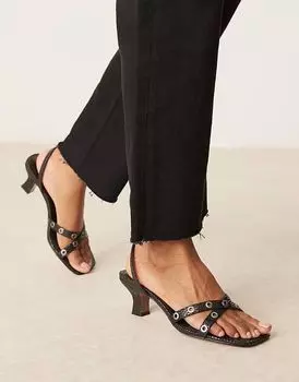 Мюли ASOS DESIGN Hyatt на среднем каблуке с люверсами из змеиной кожи черного цвета