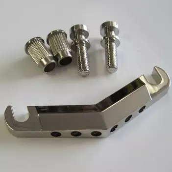 Наконечник Gretsch Nickel V Stoptail Stop со шпильками и якорями 7709343000 Nickel V Vee Streamliner tail piece 770-9343-000