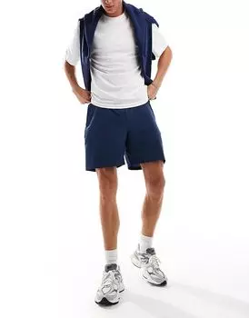 New Balance Sport Essentials шорты 7" синего цвета