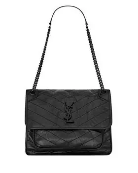 Ники Смолл в винтажной коже Saint Laurent, цвет Black