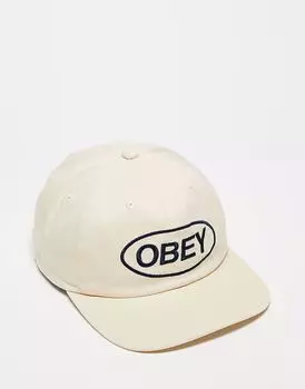 Obey - кепка с ремешком сзади, кремового цвета, с 6-панельным дизайном и овальным логотипом «Obey»