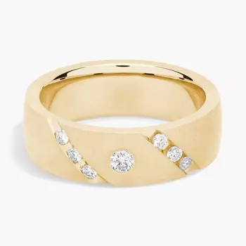 Обручальное кольцо с диагональной бриллиантовой отделкой из желтого золота 14 карат (7 мм, 1/4 карата) Blue Nile