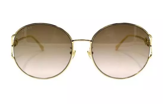 Очки солнцезащитные женские Gucci, золотой / темно - желтый