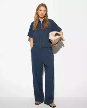 Однотонные женские эластичные брюки с карманами Parfois, темно-синий