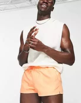Оранжевые плавки с контрастным карманом ASOS DESIGN