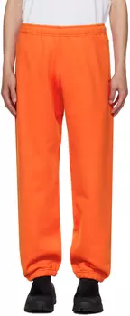 Оранжевые спортивные штаны на кулиске Stone Island