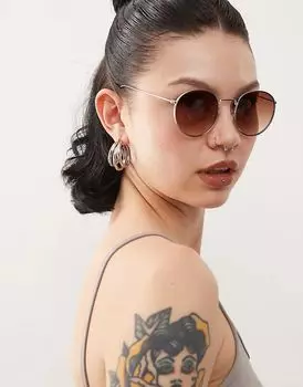 Откройте для себя круглые солнцезащитные очки коричневого цвета Weekday