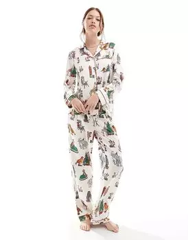 Пижамный комплект из атласного топа с длинными рукавами и брюк с рисунком цирка в рождественском стиле кремового цвета Chelsea Peers