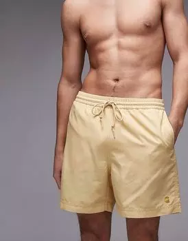 Плавки Carhartt WIP Chase желтого цвета