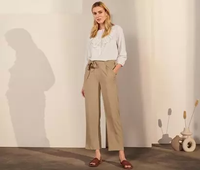 Плиссированные брюки Tchibo, бежевый