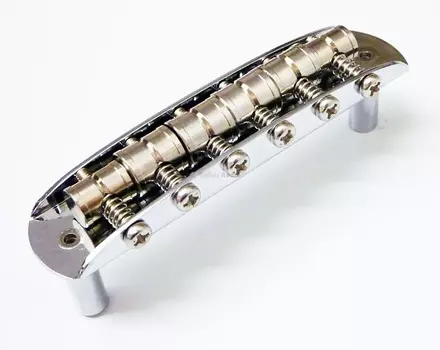 Подлинный двухстоечный гитарный бридж Fender Mustang с седлами Barrel - хром 003-5555-000
