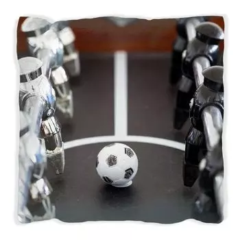 Подушка Wallario Premium, мягкая поверхность, с изображением футбольного стола крупным планом - мяч посередине, размер: 40 x 40 см, с белой спинкой