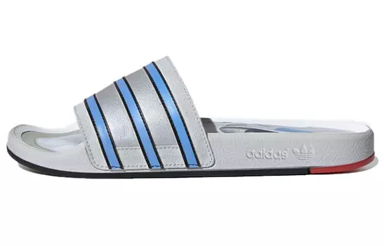 Полосатые шлепанцы Adilette Adidas