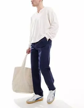 Потертые брюки темно-синего цвета