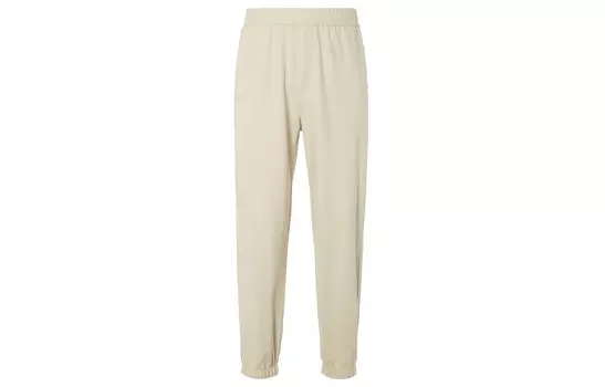 Повседневные брюки унисекс молочно-белые Uniqlo, слоновая кость