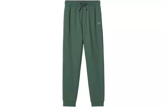 Повседневные брюки женские цвета пихты Lacoste