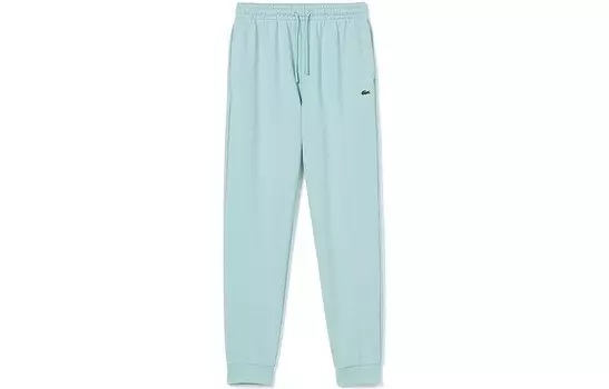Повседневные брюки женские мятно-зеленые Lacoste