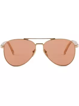 Prada Eyewear солнцезащитные очки-пилоты с гравировкой логотипа, золотистый