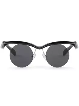 Prada Eyewear солнцезащитные очки Prada PR A24S в круглой оправе, черный