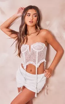 PrettyLittleThing Белая мини-юбка из фактурного джерси с узлом спереди