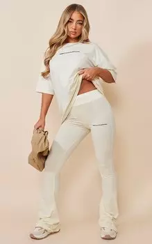PrettyLittleThing Бежевые расклешенные брюки с принтом