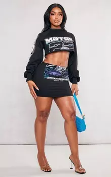 PrettyLittleThing Черная мини-юбка Shape с графическим рисунком Motorsport