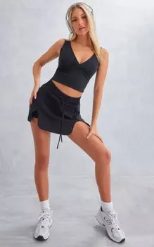 PrettyLittleThing Черная спортивная юбка с разрезом на талии и разрезом спереди