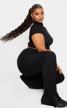 PrettyLittleThing Черные расклешенные брюки из джерси с разрезом на подоле