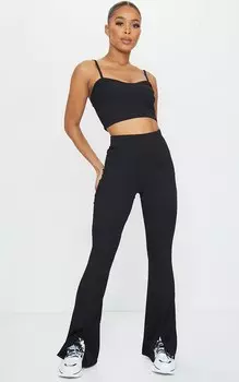 PrettyLittleThing Черные расклешенные брюки в рубчик с разрезом по низу