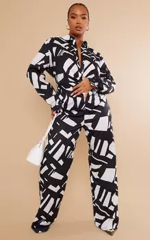 PrettyLittleThing Черные широкие брюки с абстрактным принтом Plus