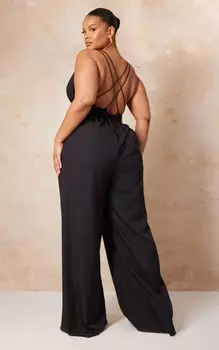 PrettyLittleThing Черный комбинезон с широкими штанинами и перекрещенными бретелями на спине Plus