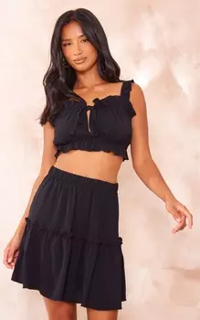 PrettyLittleThing Черный укороченный топ с рюшами и завязкой спереди Petite