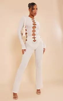 PrettyLittleThing Кремовые фактурные брюки-клеш с кольцами спереди
