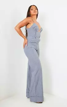 PrettyLittleThing Минерально-синий комбинезон на косточках с бретелями и потертыми краями