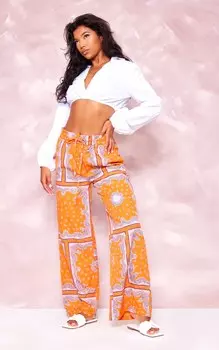 PrettyLittleThing Оранжевые широкие брюки с широкими штанинами и завязками на талии с ацтекским принтом